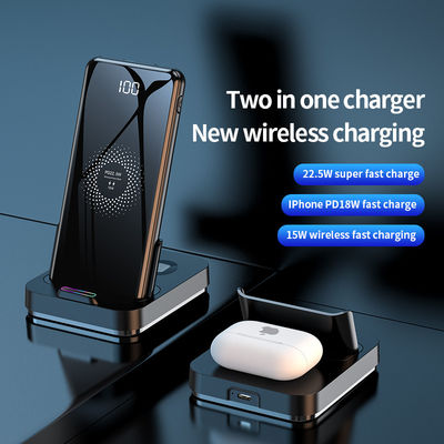 Une batterie ABS, noire, 2 en 1, chargeur sans fil 5V.